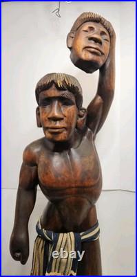 Vintage Tribal Headhunter Carved Wood Sculpture Severed Head in Hand 42 Tall Vintage Tribal Headhunter Carved Wood Sculpture Severed Head in Hand 42 Tall