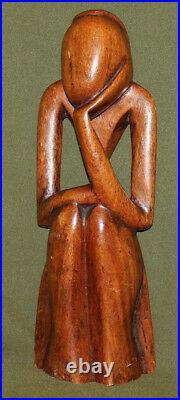 Vintage abstract hand carved wood figurine