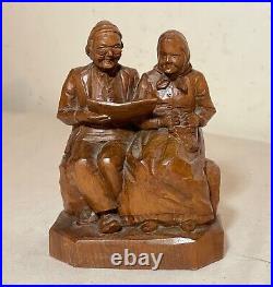 Vintage hand carved German wood elder man lady reading sculpture statue figure