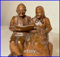 Vintage hand carved German wood elder man lady reading sculpture statue figure