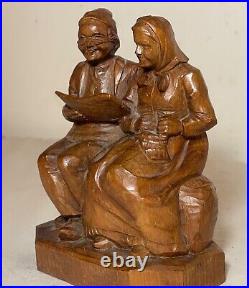 Vintage hand carved German wood elder man lady reading sculpture statue figure