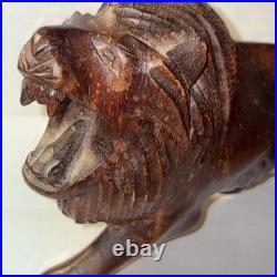 Vintage hand carved lion roaring showing teeth, very light wood. Late 60's-70's